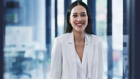 Portrait-of-a-happy-young-business-woman-laughing