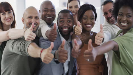 a-group-of-businesspeople-showing-thumbs-up