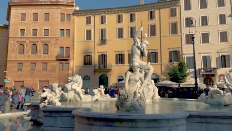 People-At-The-Piazza-Navona-With-Fontana-Del-Moro,-Moor-Fountain-In-Rome,-Italy