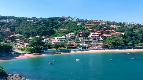 Drone-view-of-boats-swinging-in-the-water-shore-in-Brazil,-Rio-de-Janeiro
