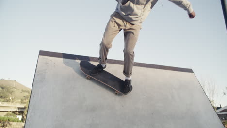 a-young-man-out-skating-at-a-skatepark
