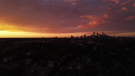 colorful-sunset-over-minneapolis,-downtown-at-the-distance,-summer-time-sunset