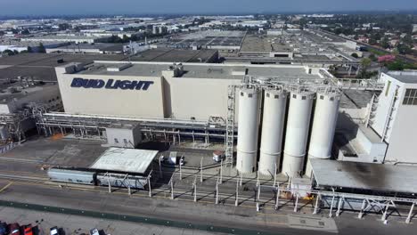 Aerial-view-of-Brewery-Plant---Anheuser-Busch-bud-light-factory,-in-Los-Angeles,-California,-USA---Orbit,-drone-shot