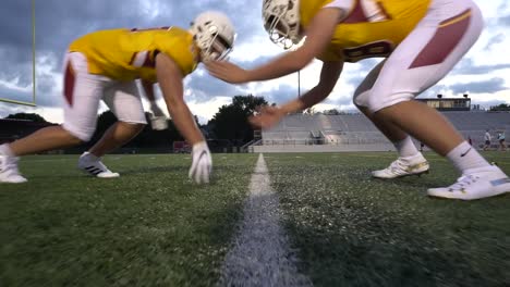 Football-linemen-hit-on-the-line-of-scrimmage