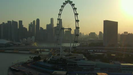 Aerial-Footage-of-Singapore-Cityscape-featuring-famous-tourist-attractions-in-Marina-Bay