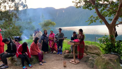 Colourful-Tiboli-tribes-in-south-Cotabato,-gathering-early-morning-by-the-side-of-the-lake