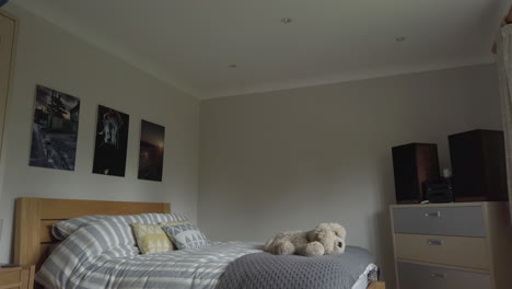 Upward-Tilt-Shot-of-a-Modern-Looking-Bedroom-in-a-Family-Home-in-Slow-Motion