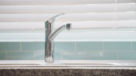 water-dripping-from-a-tap-at-home