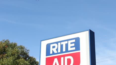 Rite-Aid-Pharmacy-Sign-Pan-Down-From-Sky