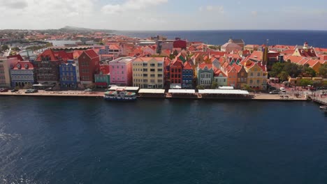 The-ferry-used-to-cross-Sint-Anna-Bay-when-the-Queen-Emma-Bridge-is-open-for-ship-traffic-in-Willemstad,-Curacao