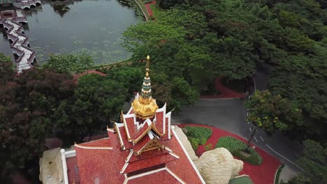 Aerial-View-on-Buddhist-Temple-With-Lion-Sculpture-in-Ancient-Siam-City-Park,-Muang-Boran,-Thailand,-Large-Collection-on-Repicas-of-Famous-Landmarks