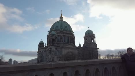 Motion-Timelapse-of-pedestrians-on-Bridge-next-to-Berlin-Cahtedral