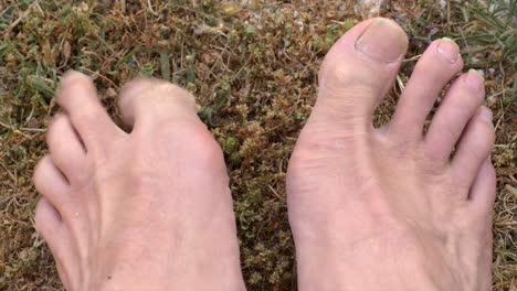 CLOSE-UP,-Mans-Toes-Curling-Feeling-The-Ground