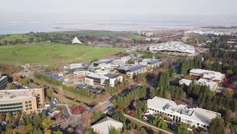 Aerial-shot-of-Googleplex,-Google-global-headquarters-in-Silicon-Valley,-Rotate-right-part-two