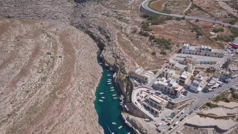 Aerial-Drone-Shot-of-a-Natural-Valley-along-the-Coast-of-the-Mediterranean-Island,-Wied-iz-Zurrieq,-Malta