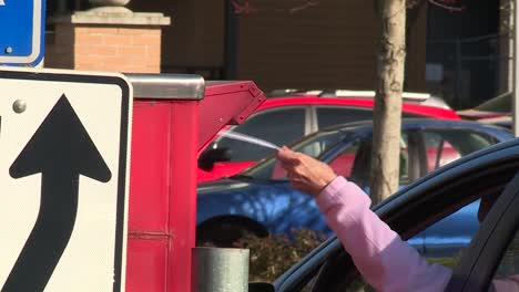 CAR-PULLS-UP-TO-DRIVE-BY-BALLOT-DROP-BOX-LOCATION-IN-WASHINGTON