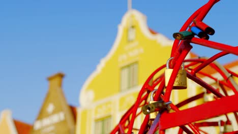 Colorful-Buildings-In-Punda-To-Love-Locks-In-Willemstad,-Curacao-On-A-Bright-Weather