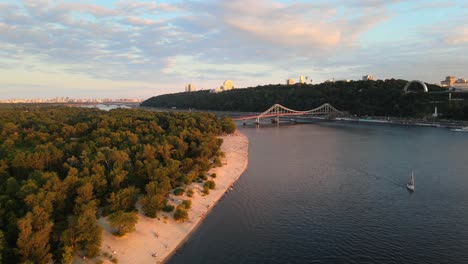 Aerial-drone-view-of-the-Dnipro-river-and-a-bridge-in-Kiev