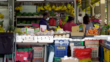 Stall-at-Whampoa-wet-market.-Customer-buy-fruits