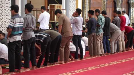 Muslims-Praying-At-Islamic-Center-NTB,-Mataram-Indonesia---wide-shot