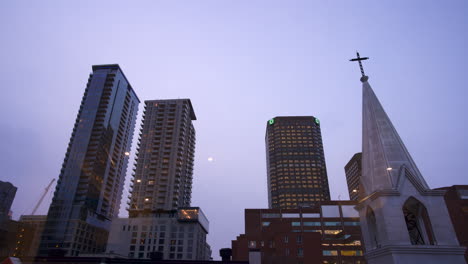 Timelapse-of-buildings-in-downtown-Montreal-from-the-view-of-a-hotel