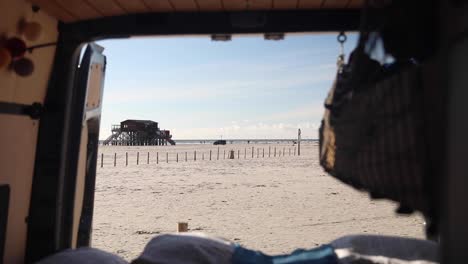 View-Of-Sankt-Peter-Ording-From-A-Parked-Van---Vanlife-In-A-Seaside-Resort-In-Germany---dolly-out-shot