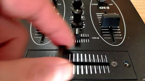 Close-up-of-a-DJ-mixer