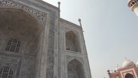 view-from-Minaret-to-Taj-Mahal-abstract-decorated-Grandiose-entrance---Pan-low-angle-wide-shot
