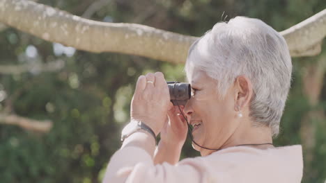 Binoculars,-hiking-and-freedom-with-a-senior-woman