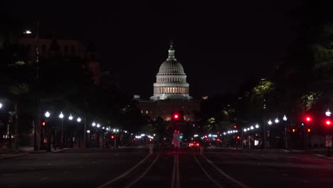 A-nearly-empty-Pennsylvania-Avenue-in-the-middle-of-the-night-showing-the-national-capital-of-the-United-States-in-Washington,-DC