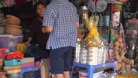 Tourist-Man-Haggling-at-the-Local-Market