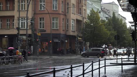 Bad-weather-with-strong-rain-showers-on-street-of-Berlin-city,-Germany