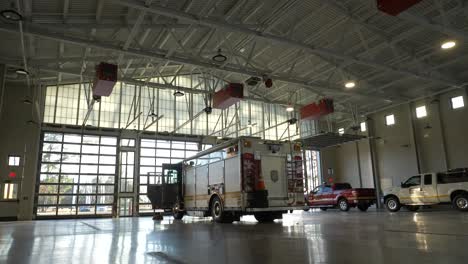 Fire-rescue-truck-sits-parked-inside-a-fire-station-garage