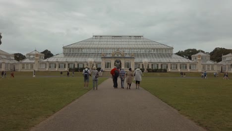 wide-shot-approaching-the-famous-Temperate-House-at-Kew-Gardens-in-London