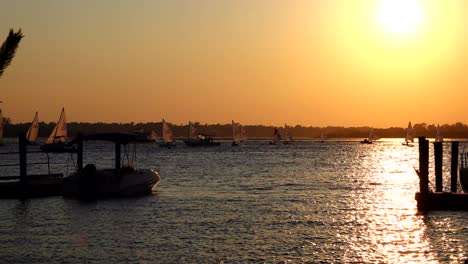 Small-Sailboat-Regatta-during-an-amazing-sunset-in-the-Cape-Fear-River