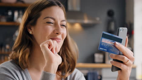 Credit-card,-excited-and-smartphone-of-woman