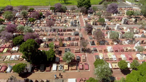 Scenic-aerial-flight-directly-above-densely-packed-cemetery-graveyard