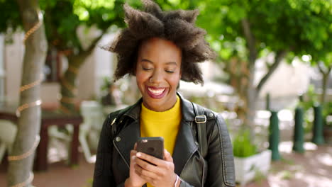 A-black-woman-texting-on-social-media-using
