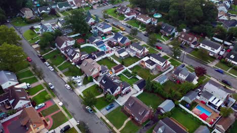A-top-down-view-over-a-suburban-neighborhood-in-the-evening