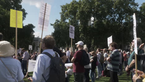 Crowds-Of-People-Listening-With-Placards-At-Leaseholders-Together-Rally-In-Parliament-Square