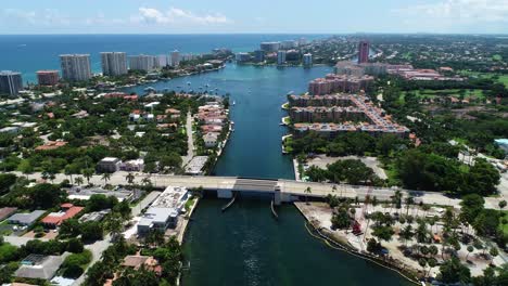 Boca-Raton,-Florida-USA---8-30-2021:-Drone-video-pushing-forward-over-Palmetto-Park-Bridge-to-show-Lake-Boca-Raton