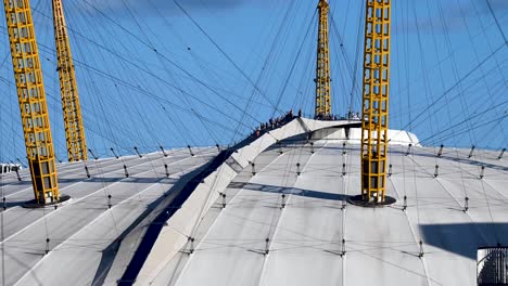 Closeup-Time-lapse-of-The-O2-Arena,-formerly-known-as-the-Millennium-Dome,-with-tourist-on-the-upper-deck