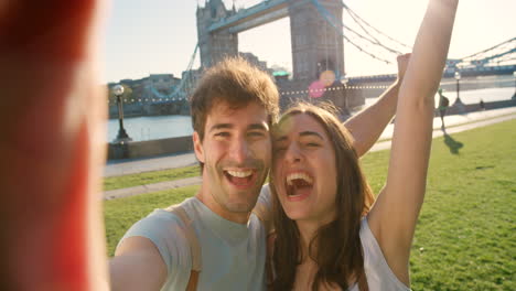 Couple,-selfie-and-travel-holiday-with-Westminster