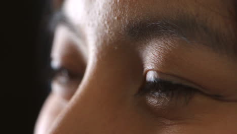 Closeup-of-the-eyes-of-an-asian-woman-talking-to