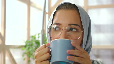 Hijab,-Muslim-woman-and-thinking-with-coffee