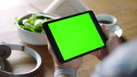 Green-screen,-tablet-and-hands-of-a-business