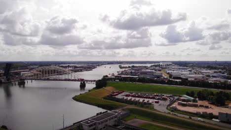 Aerial-View-Of-Opened-Bascule-Bridge-Over-Noord-River