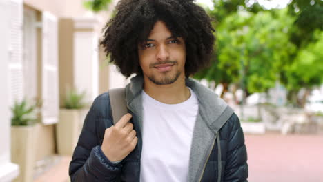 Portrait-of-an-Afro-man-smiling-outside