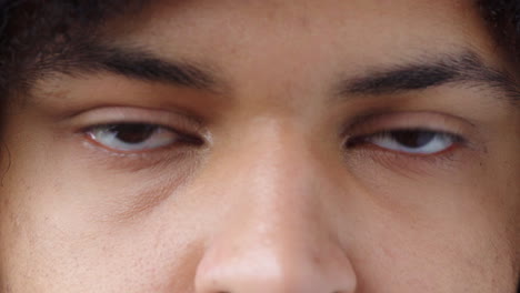 Closeup-of-a-man-staring-and-blinking
