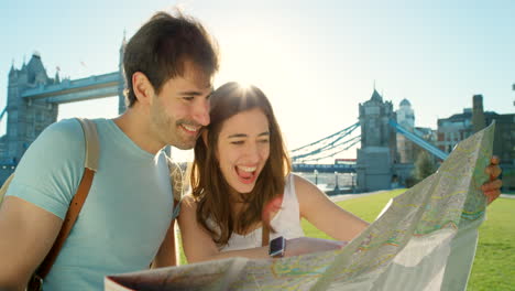 Travel,-holiday-and-couple-with-map-for-direction